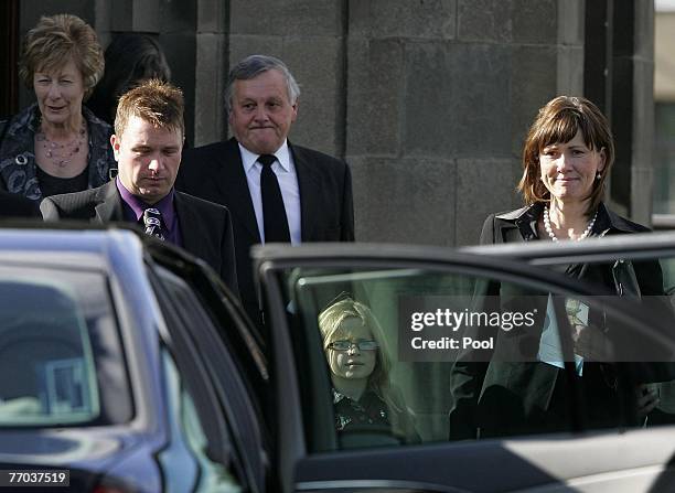 The McRae family including wife Alison McRae and father Jimmy McRae leave the funeral of Colin McRae and son Johnny at East Chapel, Daldowie...