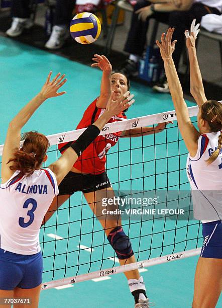 Russian Ologa Fateeva and Ekaterina Gamova and German Cornelia Dumler in action during Volleyball game German vs Russia, in the second phase of...