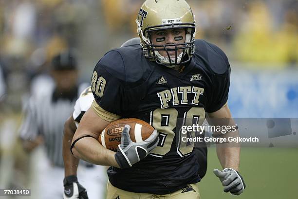 Tight end Nate Byham of the University of Pittsburgh Panthers runs with the football after catching a pass against the Grambling State University...