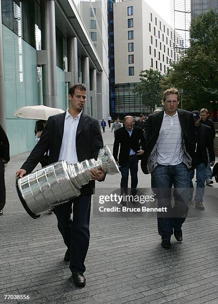 Ryan Getzlaf and Corey Perry of the Anaheim Ducks along with the Stanley Cup tour London on September 26, 2007 prior to this weekend's games against...