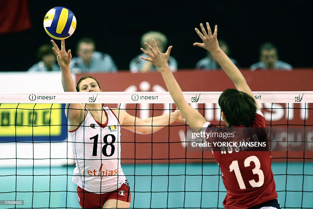 Belgium's Anja Van Damme (L) and Poland'