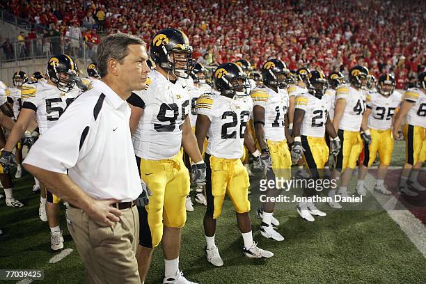 Head coach Kirk Ferentz of the Iowa Hawkeyes gets ready to lead his team onto the field before the game against the Wisconsin Badgers at Camp Randall...