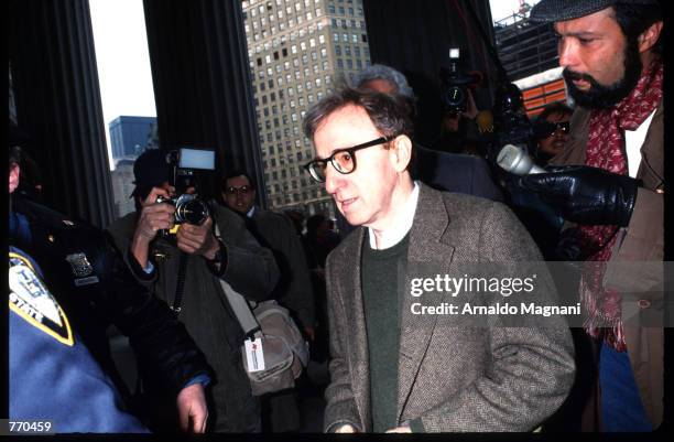 Director Woody Allen leaves the Manhattan Supreme Courthouse March 22, 1993 in New York City. Allen's ex-girlfriend Mia Farrow is filing for custody...