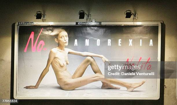 Billboard reading "No Anorexia" shows an Italian advertising campaign featuring French comedian and anorexia sufferer Isabelle Caro photographed by...