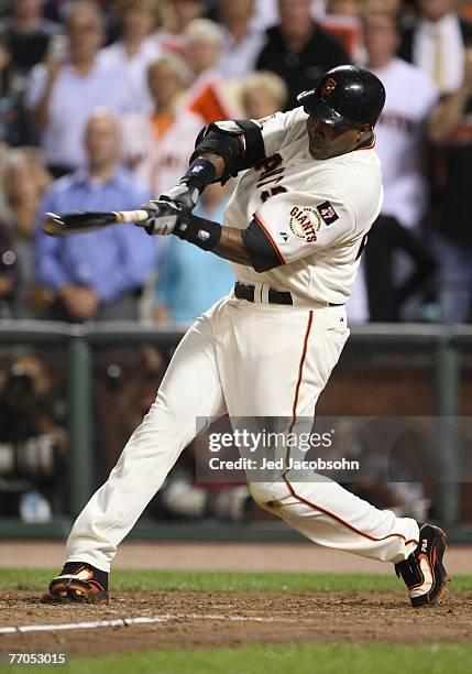 Barry Bonds of the San Francisco Giants flies out during his final home at bat as a Giant against the San Diego Padres during a Major League Baseball...