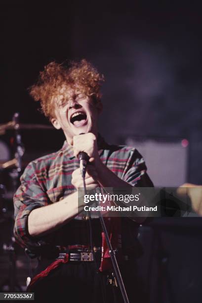 English singer Mick Hucknall performs on the set of a Simply Red video shoot in London, September 1985.