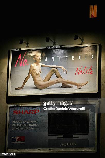 Billboard reading "No Anorexia" shows an Italian advertising campaign featuring French comedian and anorexia sufferer Isabelle Caro photographed by...