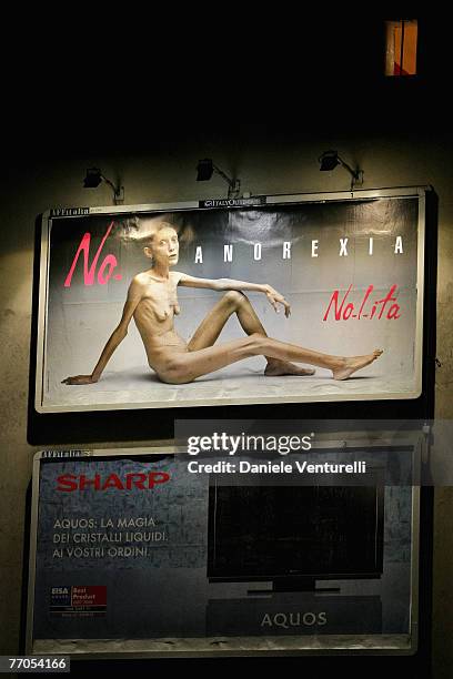 Billboard reading "No Anorexia" shows an Italian advertising campaign featuring French comedian and anorexia sufferer Isabelle Caro photographed by...