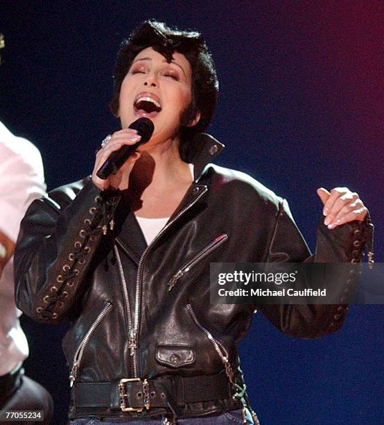 Cher performs as Elvis.