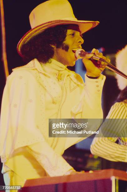 Sly Stone of Sly And The Family Stone performs on stage at White City Stadium, London, 15th July 1973.