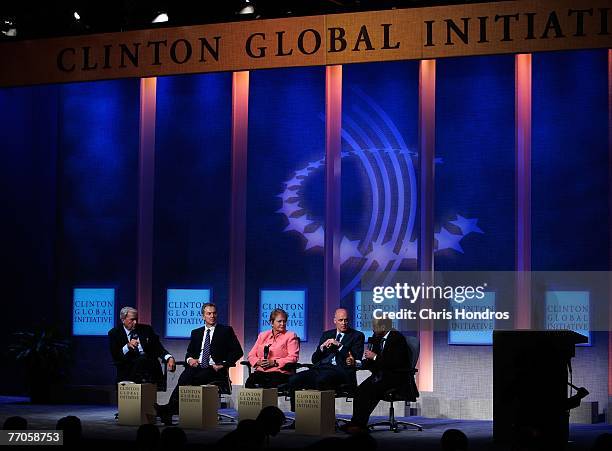 Moderator Tom Brokaw, Tony Blair, former Prime Minister of the United Kingdom, Gro Harlem Brundtland, former Prime Minister of Norway, Hank M....