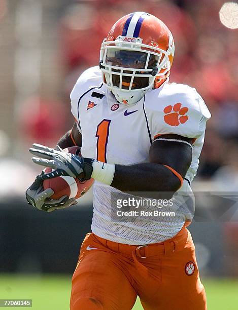 James Davis of the Clemson Tigers carries the ball against the NC State Wolfpack at Carter Finley Stadium on September 22, 2007 in Raleigh, North...