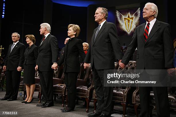 President George W. Bush and First Lady Laura Bush are joined by former President Bill Clinton, US Senator Hillary Clinton , former President George...