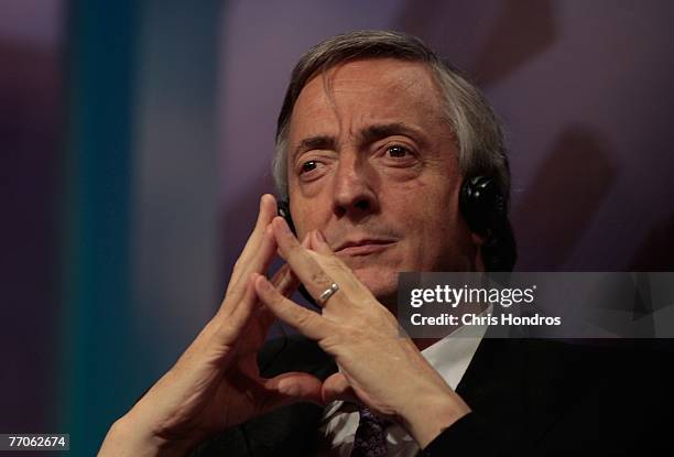 President Nestor Carlos Kirchner of Argentina listens to a Spanish translation during a panel discussion about Latin America at the Clinton Global...