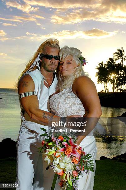 Duane "Dog" Chapman and Beth Chapman pose at sunset after their lavish wedding ceremony at the Hilton Waikoloa Village in Waikoloa, on the Big Island...