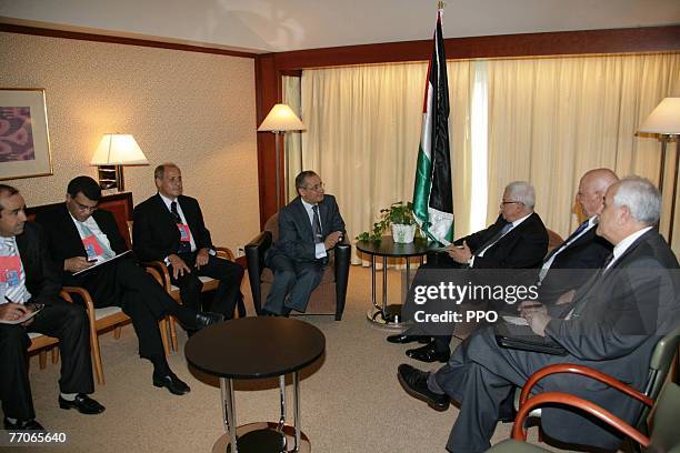 In this handout image supplied by the Palestinian Press Office , Palestinian President Mahmoud Abbas meets with Tunisian Foreign Minister Abdul Wahab...