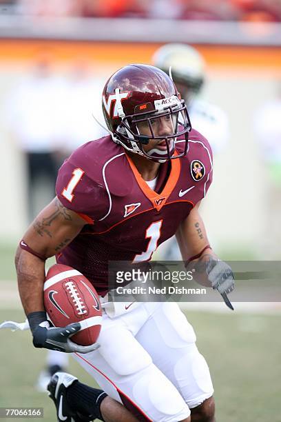 Cornerback Victor "Macho" Harris of the Virginia Tech University Hokies returns a punt against the College of William & Mary Tribe on September 22,...