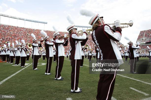 The brass section of the Marching Virginians, the marching band, performs during the game between the Virginia Tech University Hokies and the College...