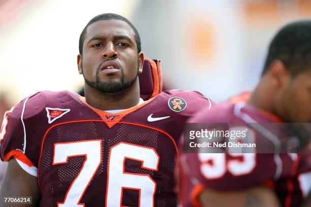 Offensive lineman Duane Brown of the Virginia Tech University Hokies stands on the sideline during game against the College of William & Mary Tribe...