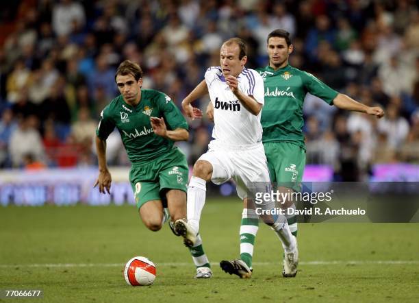 Real Madrid's Dutch Arjen Robben fights for a ball during the La Liga match between Real Madrid and Real Betis at the Santiago Bernabeu stadium on...