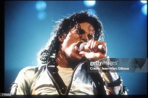 Entertainer Michael Jackson sings at a concert November 8, 1988 in California. Jackson, who was the lead singer for the Jackson Five by age eight,...