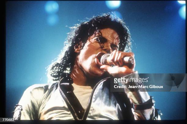 Entertainer Michael Jackson sings at a concert November 8, 1988 in California. Jackson, who was the lead singer for the Jackson Five by age eight,...