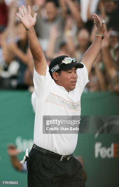 Sixteen year old Tadd Fujikawa from Hawaii reacts to his eagle putt on the 18th green during the second round of the Sony Open in Hawaii held at...