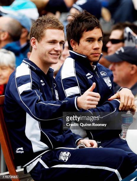 Joel Selwood and Mathew Stokes of Geelong acknowledge the crowd during the 2007 AFL Grand Final Parade on September 28, 2007 in Melbourne, Australia.