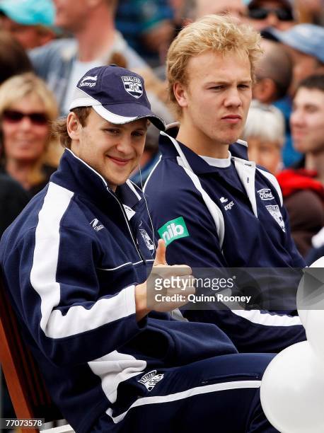 Gary Ablett and Nathan Ablett of Geelong acknowledge the crowd during the 2007 AFL Grand Final Parade on September 28, 2007 in Melbourne, Australia.