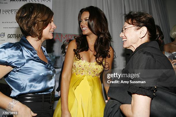 Actress Marcia Gay Harden, Miss Universe 2006 Zuleyka Rivera and Marcia's mother attend Volvo store opening celebration with Hamptons Magazine cover...