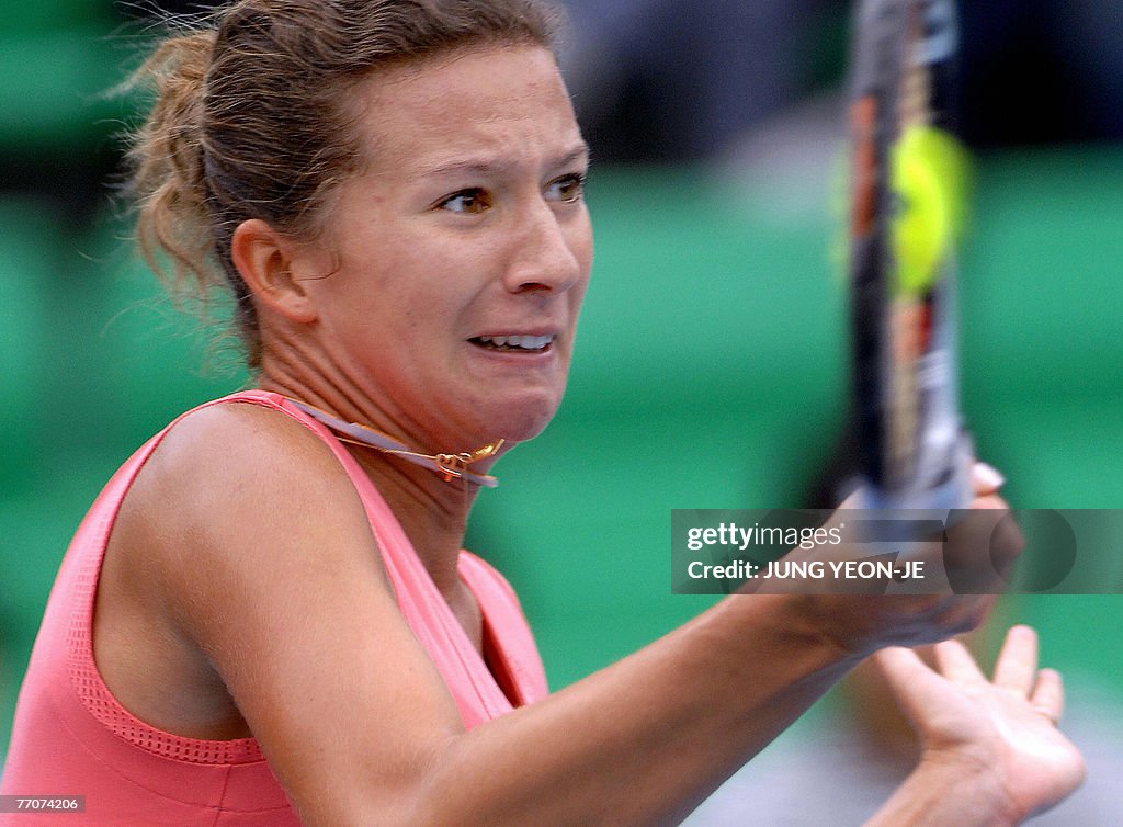 Marta Domachowska of Poland returns the
