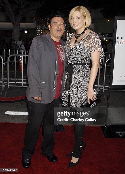 Comedian Carlos Mencia and wife Amy arrive at the premiere of Dreamworks' 'The Heartbreak Kid' at Mann's Village Theater on September 27, 2007 in Los...