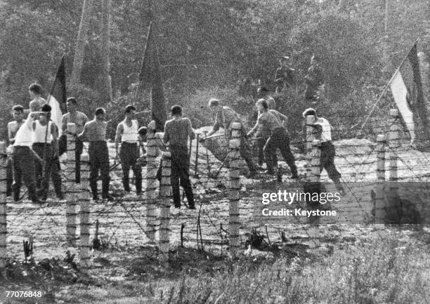 Members of the Volkspolizei, the East German national police, build attack positions near the border with West Berlin, 28th September 1961.