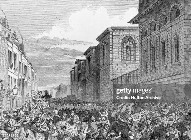 Crowd gathers outside Newgate Prison for a public execution, circa 1860. Baglioni's bang-up ginger pop is on sale to onlookers and the gallows is...