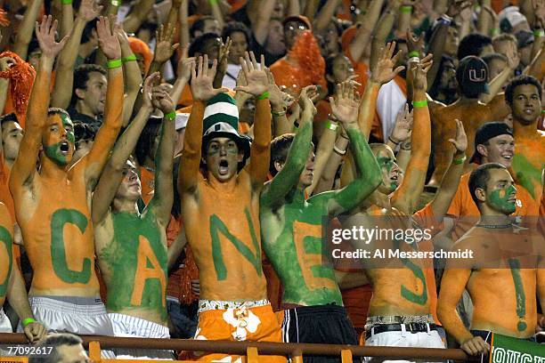 University of Miami Hurricanes fans celebrate a touchdown against Texas A&M Aggies at the Orange Bowl on September 20, 2007 in Miami, Florida. Miami...