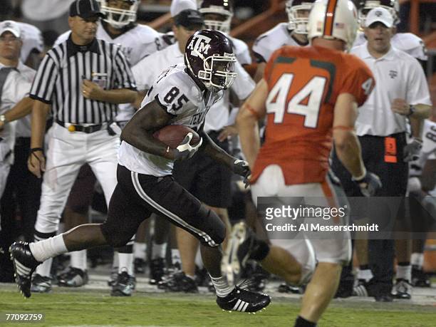 Tight end Martellus Bennett of Texas A&M Aggies rushes upfield against the University of Miami Hurricanes at the Orange Bowl on September 20, 2007 in...