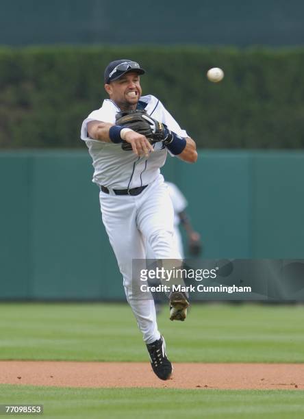 Placido Polanco of the Detroit Tigers throws during the game against the Chicago White Sox at Comerica Park in Detroit, Michigan on September 6,...