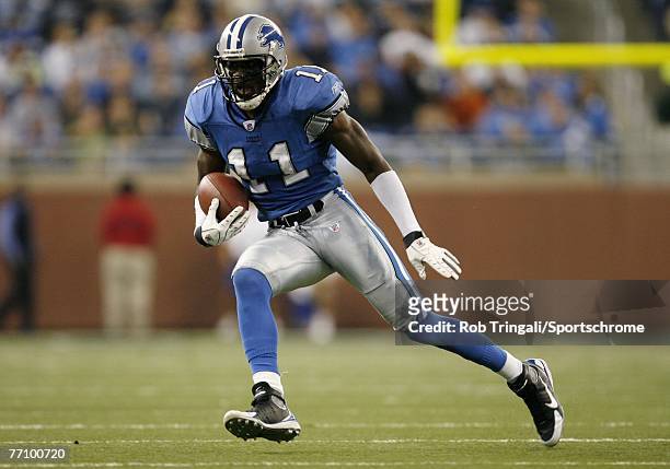 Roy Williams of the Detroit Lions runs with the ball against the Minnesota Vikings at Ford Field on September 16, 2007 in Detroit, Michigan. The...