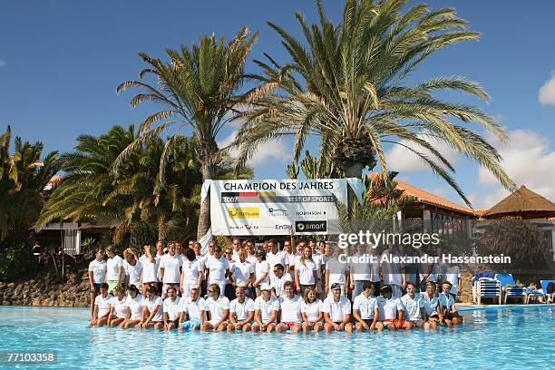 Athlets pose for a photograph at Esquinzo Robinson Club resort on September 28, 2007 on the island of Fuerteventura, Spain. More than 80 German top...