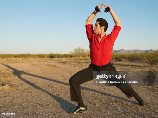 hispanic male flamenco dancer posing - castanets stock pictures, royalty-free photos & images