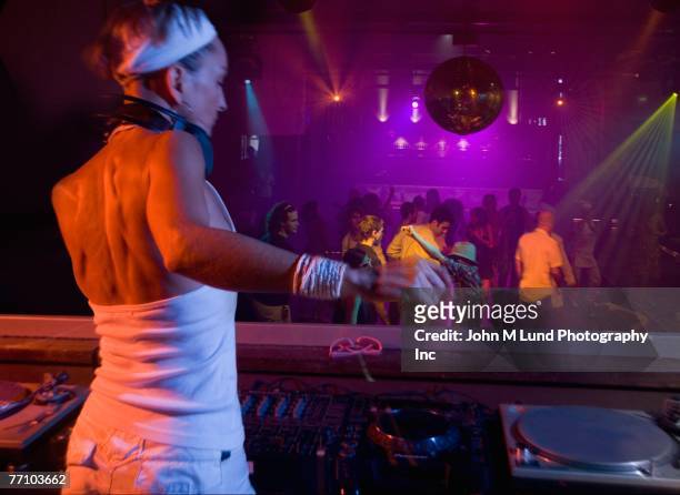 hispanic woman djing at nightclub - djiang stock pictures, royalty-free photos & images