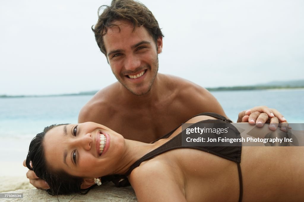 South American couple at beach