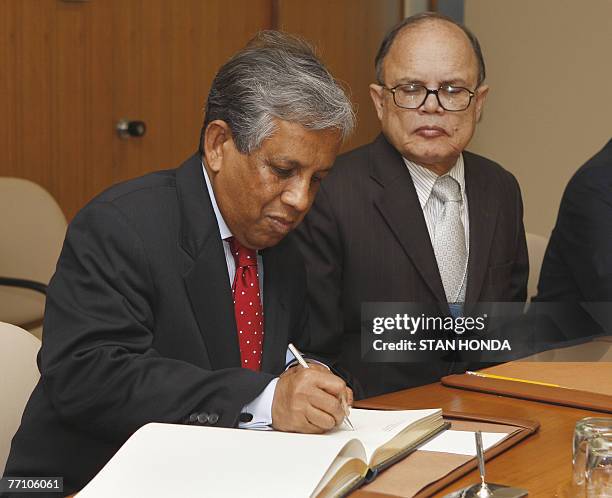 Fakhruddin Ahmed , Prime Minister of Bangladesh, signs a guest book before a meeting with United Nations Secretary General Ban Ki-Moon, 29 September...