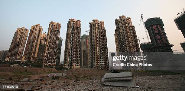 General view of buildings under construction near the People's Bank of China office building on September 29, 2007 in Chongqing, China. The People's...