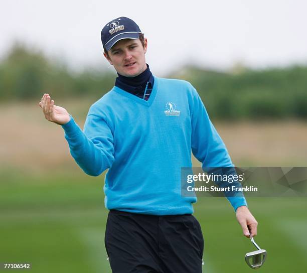 Justin Rose of The Great Britain and Ireland Team reacts to his putt on the 15th hole during the third day morning greensomes at the Seve Trophy 2007...