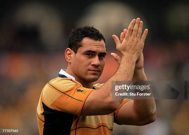 Australian captain George Smith applauds the fans at the end of the IRB Rugby World Cup Pool B match between Australia and Canada at the Stade...