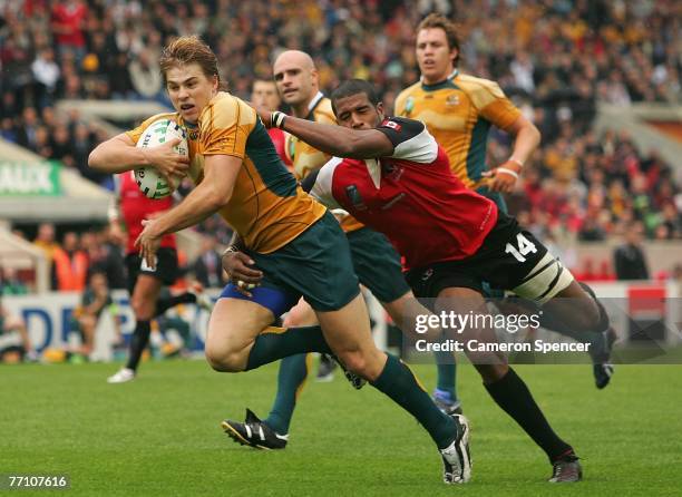 Drew Mitchell of Australia scores a try during the IRB Rugby World Cup Pool B match between Australia and Canada at Stade Chaban-Delmas September 29,...