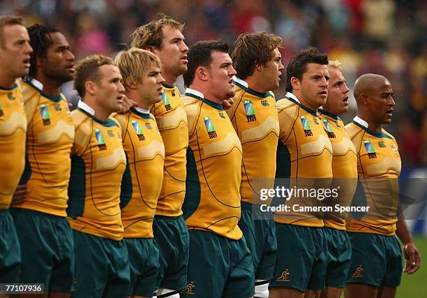 The Australian team sing their national anthem during the IRB Rugby World Cup Pool B match between Australia and Canada at Stade Chaban-Delmas...