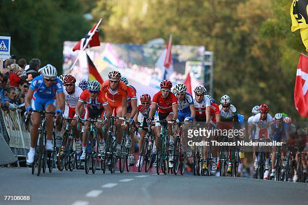 The peloton rides through the streets during the under 23 road race during the UCI Road World Championships on September 29, 2007 in Stuttgart,...
