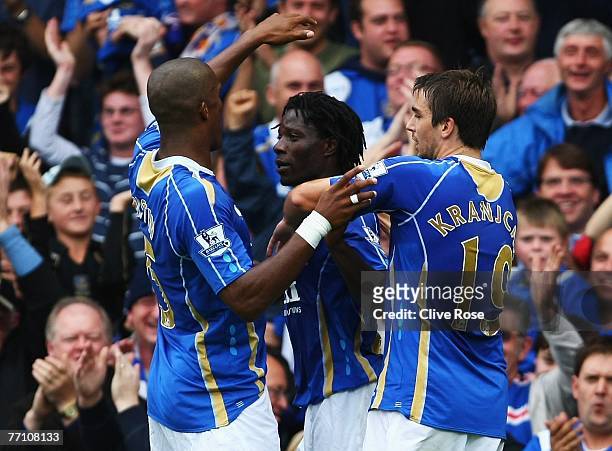 Benjani of Portsmouth celebrates his goal during the Barclays Premier League match between Portsmouth and Reading at Fratton Park on September 29,...